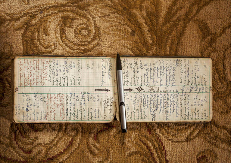Sammy Baloji, Notebook of the Sanga chief Mpala Swanage’s father, containing the list of names of all his predecessors. Fungurume, 2014